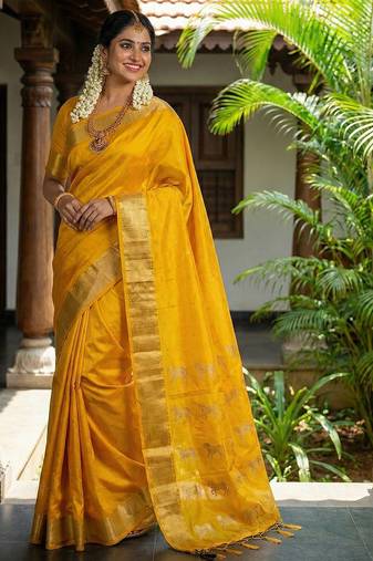 Yellow color soft silk fabric woven designer saree for ethnic looks