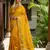 Yellow color soft silk fabric woven designer saree for ethnic looks