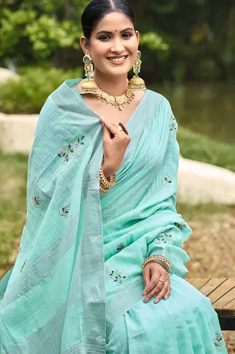 Turquoise linen sophisticated ethnic saree