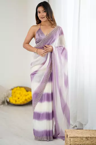 Lavender color beautiful fendy satin fabric saree with glamorous zarkan diamond work