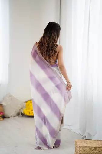 Lavender satin saree with glamorous zarkan diamond work