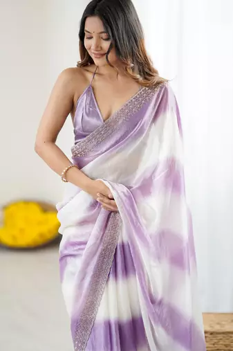 Lavender satin saree with glamorous zarkan diamond work
