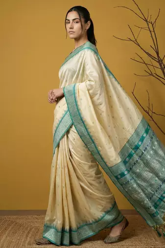 handloom soft art silk saree with zari woven motifs contrast traditional border