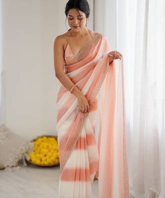 Peach satin saree with glamorous zarkan diamond work 1