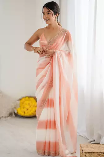 Peach satin saree with glamorous zarkan diamond work