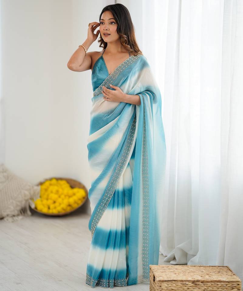 Sky blue color beautiful fendy satin fabric saree with glamorous zarkan diamond work