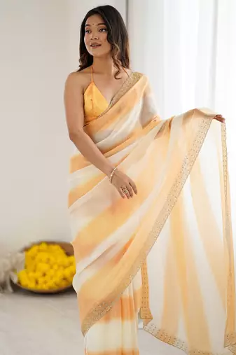 Yellow color beautiful fendy satin fabric saree with glamorous zarkan diamond work