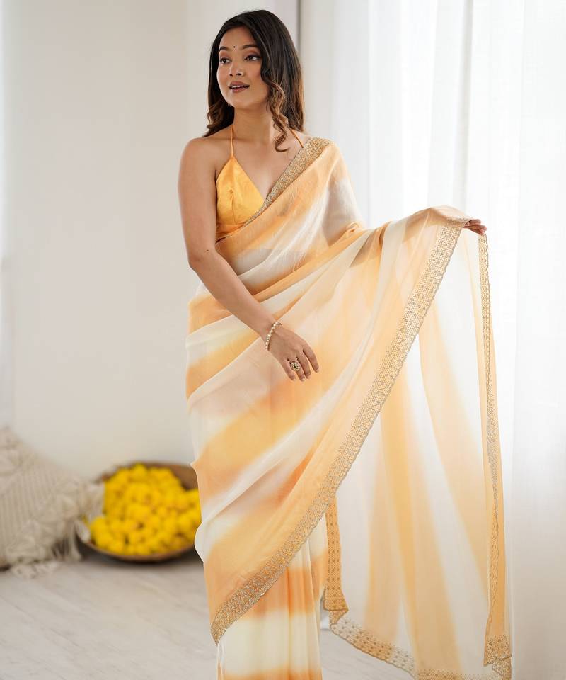 Yellow color beautiful fendy satin fabric saree with glamorous zarkan diamond work