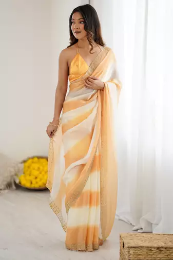 Yellow satin saree with glamorous zarkan diamond work