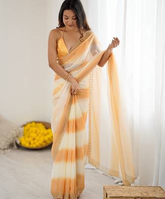 Yellow satin saree with glamorous zarkan diamond work 4