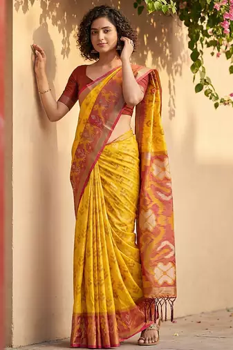 Yellow color pochampalli silk saree with graceful woven designer looks