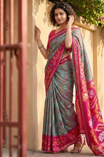 Grey color pochampalli silk saree with graceful woven designer looks