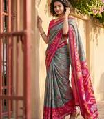 Grey color pochampalli silk saree with graceful woven designer looks