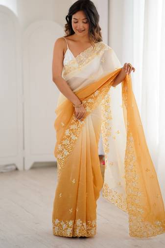 Yellow color crunchy fabric beautiful sequins work bollywood style ceremonial saree