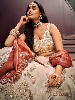Outstanding Soft Beige Embroidered Silk Wedding Wear Lehenga Choli 5