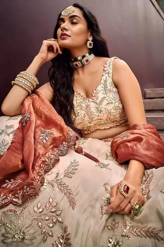 Outstanding Soft Beige Embroidered Silk Wedding Wear Lehenga Choli