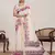 Off white color linen silk fabric beautiful partywear saree
