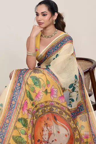 Yellow linen silk blend partywear saree