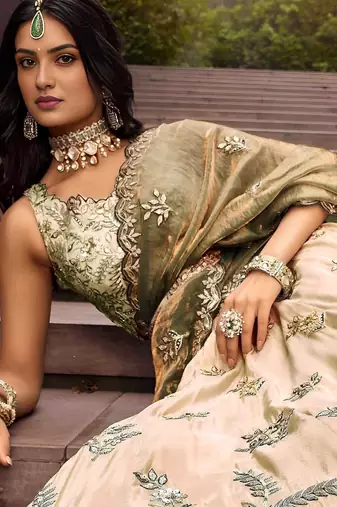 Precious Soft Beige Embroidered Silk Wedding Wear Lehenga Choli