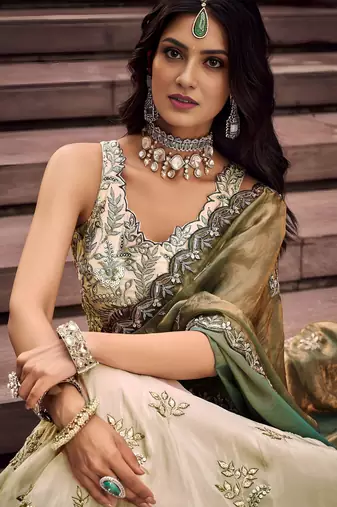 Precious Soft Beige Embroidered Silk Wedding Wear Lehenga Choli