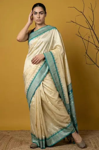Handloom soft silk saree with zari woven motifs contrast traditional border