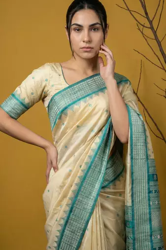 Handloom soft silk saree with zari woven motifs contrast traditional border