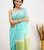 Turquoise soft linen slub jacuard work designer saree with blouse