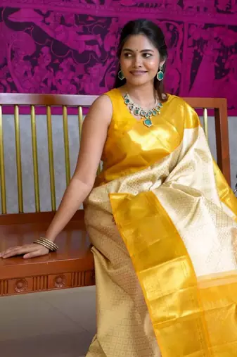 Light yellow soft silk blend banarasi jacuard work designer saree with blouse