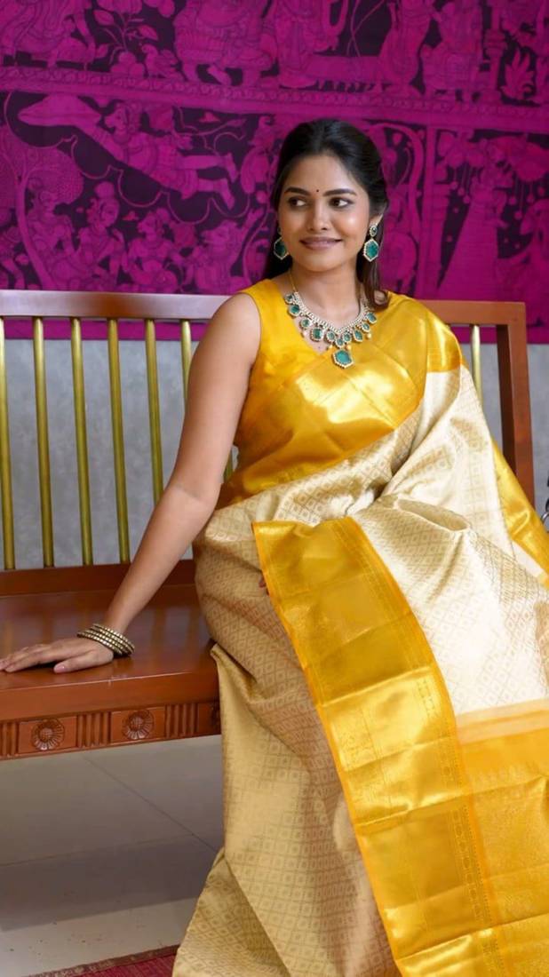 Light yellow soft silk blend banarasi jacuard work designer saree with blouse