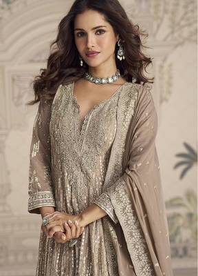 Beige embroidered georgette anarkali suit semi stitched up to 42" size 3