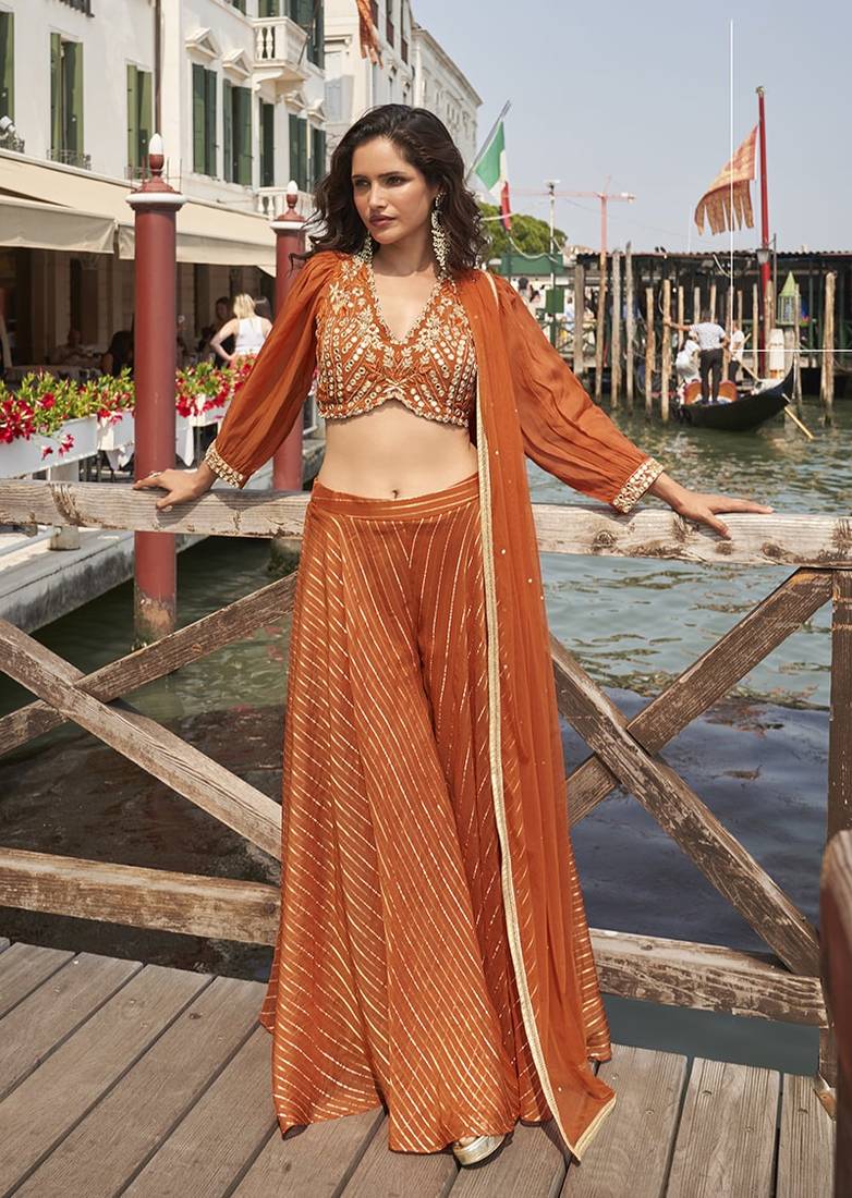 Rust viscose jacquard silk embroidered palazzo set semi stitched up to 42" size