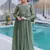 Green women silver crunchy fabric beads embroidered long gown | party wear flared ethnic gown