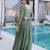 Green women silver crunchy fabric beads embroidered long gown | party wear flared ethnic gown
