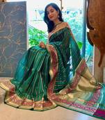 Green soft silk blend banarasi jacuard work designer saree with blouse