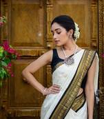 Off white soft silk blend banarasi jacuard work designer saree with blouse