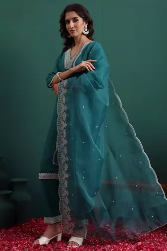 Pine green color beautiful suit for classy trendy girl