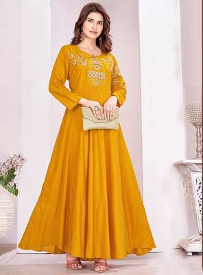 Yellow color beautiful embroidered ceremonial gown for classy looks 1