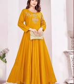 Yellow color beautiful embroidered ceremonial gown for classy looks