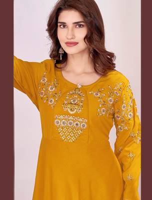 Yellow color beautiful embroidered ceremonial gown for classy looks 2