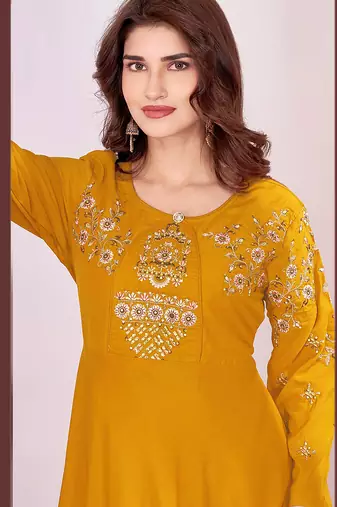 Yellow color beautiful embroidered ceremonial gown for classy looks