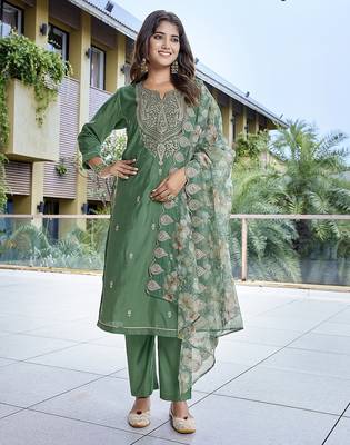 Green color stylish partywear readymade suit 1
