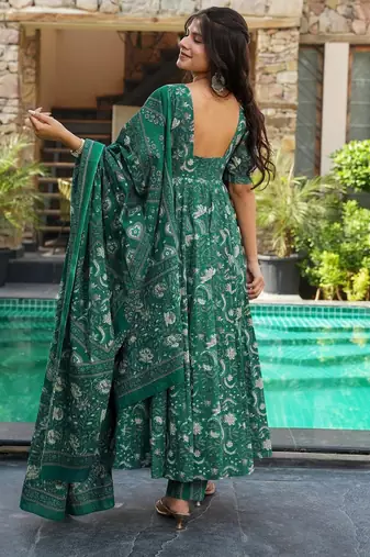 Green color muslin digital printed partywear attire for girl