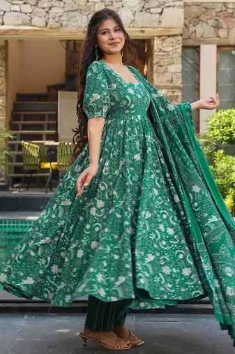 Green color muslin digital printed partywear attire for girl