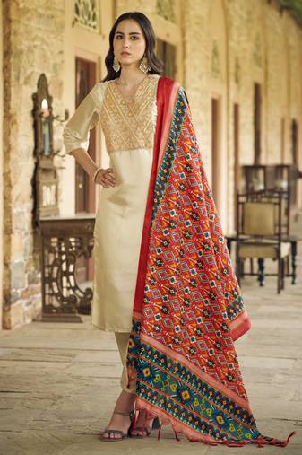 Beige color silk blend ethnic fancy partywear suit with classy looks