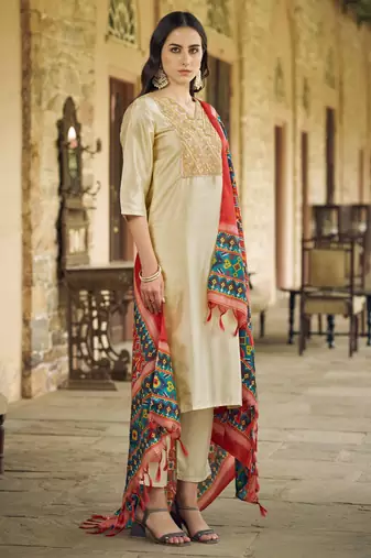 Beige color silk blend fancy partywear suit with classy looks