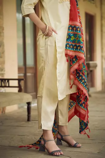 Beige color silk blend fancy partywear suit with classy looks