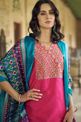 Pink color silk blend fancy partywear suit with classy looks