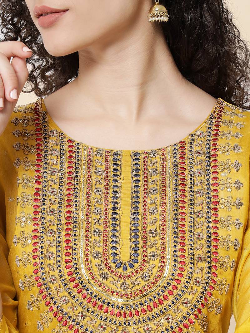 Yellow color chanderi modal fabric with beautiful embroidered work fancy looks