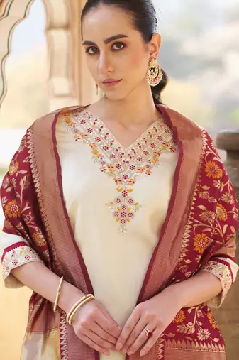 Cream color silk blend beautiful embroidered kurta set with dupatta