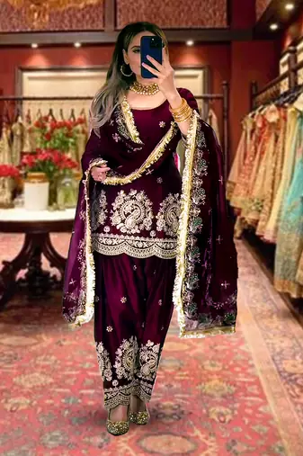 Purple heavy embroidered festive suit